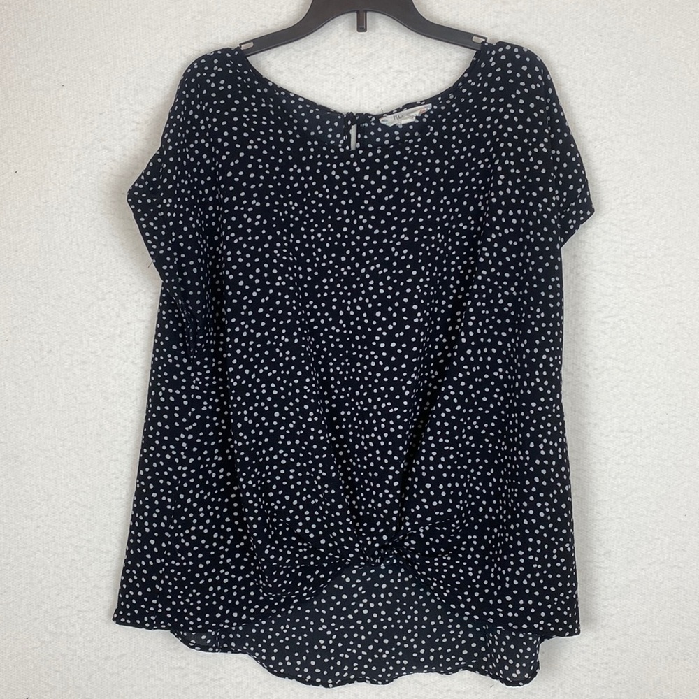 Black and white women blouse polka dot pattern tied in the front